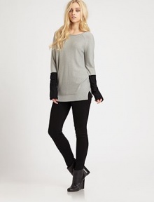 Finished with a hint of wool and silk, this lengthy, lightweight boatneck features oversized sleeves and a trend-smart colorblock design. BoatneckLong sleevesLonger length hits below the hips60% viscose/25% nylon/10% wool/5% silkDry cleanImportedModel shown is 5'10 (177cm) wearing US size Small. Finished with a hint of wool and silk, this lengthy, lightweight boatneck features oversized sleeves and a trend-smart colorblock design. BoatneckLong sleevesLonger length hits below the hips60% viscose/25% nylon/10% wool/5% silkDry cleanImportedModel shown is 5'10 (177cm) wearing US size Small.