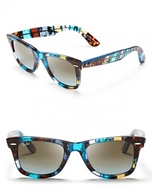 Color punches up the classic Ray-Ban Wayfarer silhouette, in shades of cool blue that will make a splash.