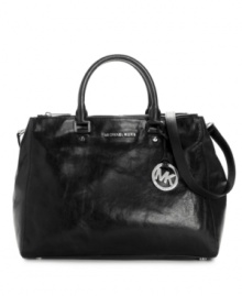 A versatile work-to-evening bag, the glossy Dressy tote features a polished exterior and protective feet that help it stay elegant and professional. A versatile work-to-evening bag, the glossy Dressy tote features a polished exterior and protective feet that help it stay elegant and professional.