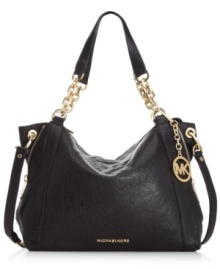 Classic and cool, this MICHAEL Michael Kors satchel will add optimal appeal to your accessory repertoire. Butter-soft leather, gleaming hardware, spacious interior--carry it for effortless go-anywhere style. Classic and cool, this MICHAEL Michael Kors satchel will add optimal appeal to your accessory repertoire. Butter-soft leather, gleaming hardware, spacious interior--carry it for effortless go-anywhere style.