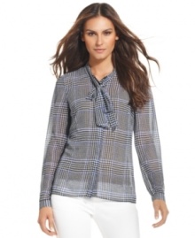 A chic houndstooth print brings a touch of sophistication to this petite blouse from MICHAEL Michael Kors. Add it to your work wardrobe for a polished look!