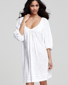 A three-quarter sleeve sleepshirt with pretty tonal floral print and tonal striped hem.