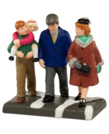 Reunited for the holiday, this beautiful family takes a stroll to see the city up in lights. An heartwarming figurine from Department 56.