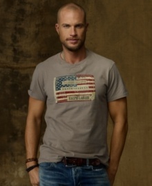 A wear-it-anywhere cotton jersey tee channels a rugged, laid-back vibe with an artfully weathered flag patch at the chest. A wear-it-anywhere cotton jersey tee channels a rugged, laid-back vibe with an artfully weathered flag patch at the chest.