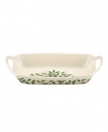 Pretty for serving hot cinnamon rolls, gingerbread and other holiday baked goods, this porcelain bread basket from Lenox's collection of serveware and serving dishes has rope trim and a holly motif to match the beloved Holiday dinnerware line. Pretty for serving hot cinnamon rolls, gingerbread and other holiday baked goods, this porcelain bread basket from Lenox's collection of serveware and serving dishes has rope trim and a holly motif to match the beloved Holiday dinnerware line.