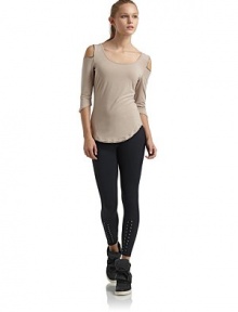 THE LOOKWide scoop necklineCold shoulder details with metallic trimCurved hemPullover styleTHE FITAbout 22 from shoulder to hemTHE MATERIALMicromodal/spandexCARE & ORIGINMachine washMade in USAModel shown is 5'8 (172½cm) wearing US size Small. 