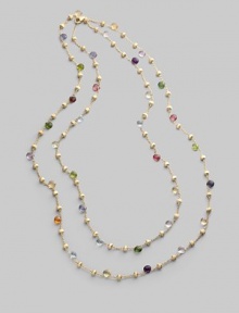 Long enough to double, this single strand necklace of 18k gold links is dotted with a colorful array of faceted semi-precious gemstones, including tourmaline, quartz, peridot, rhodolite, garnet, iolite, tanzanite, aquamarine, apatite, topaz, citrine and amethyst. Gemstones 18k yellow gold Length, about 47¼ Lobster clasp Made in Italy