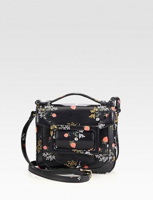 A pretty floral print on textured embossed leather for a vintage-inspired design.Top handle, 2 dropAdjustable shoulder strap, 18-20 dropMagnetic snap flap closureThree inner compartmentsOne inside zip pocketSatin lining8W X 7H X 1¾DMade in Italy A pretty floral print on textured embossed leather for a vintage-inspired design.Top handle, 2 dropAdjustable shoulder strap, 18-20 dropMagnetic snap flap closureThree inner compartmentsOne inside zip pocketSatin lining8W X 7H X 1¾DMade in Italy