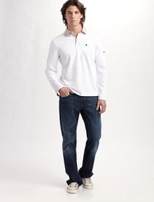 A sport-inspired classic, redefined for the modern man in a superior cotton knit with a hint of stretch and a small zip pocket on the sleeve. Concealed two-button placket Sleeve zip pocket 97% cotton/3% spandex Machine wash Imported 