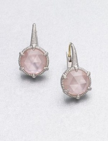 A simple chic design with a mother-of-pearl doublet accented with faceted pink crystals. Mother-of-pearl doublet accented with pink crystalsRhodium-plated sterling silverLength, about .75LeverbackImported A simple chic design with a mother-of-pearl doublet accented with faceted pink crystals. Mother-of-pearl doublet accented with pink crystalsRhodium-plated sterling silverLength, about .75LeverbackImported