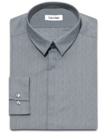 A shadowy gray pattern makes this slim-fit shirt from Calvin Klein right at home in the concrete jungle. A shadowy gray pattern makes this slim-fit shirt from Calvin Klein right at home in the concrete jungle.