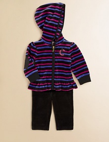 The velour hoodie that started a mini fashion revolution is paired with a pair of matching leggings for a cozy, cool ensemble. Hoodie Attached hoodLong sleevesZip-frontRuffled hemLeggings Elastic waistbandHoodie: 78% cotton/22% polyesterLeggings: CottonMachine washImported The velour hoodie that started a mini fashion revolution is paired with a pair of matching leggings for a cozy, cool ensemble. Hoodie Attached hoodLong sleevesZip-frontRuffled hemLeggings Elastic waistbandHoodie: 78% cotton/22% polyesterLeggings: CottonMachine washImported