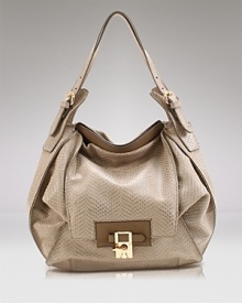 Kooba's slouchy leather shoulder bag raises the sartorial bar: it holds all the daytime essentials yet still manages to look chic under your arm. Kooba's slouchy leather shoulder bag raises the sartorial bar: it holds all the daytime essentials yet still manages to look chic under your arm.