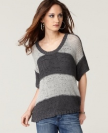 Wide stripes and an open knit give this petite sweater by Calvin Klein Jeans casual-chic appeal. Wide stripes and an open knit give this petite sweater by Calvin Klein Jeans casual-chic appeal.
