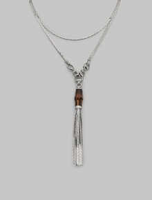 A bamboo bead and sterling silver tassels drop elegantly from a modern, snake-inspired chain with horsebit details. Bamboo Sterling silver Length around neck, about 43 Made in Italy A bamboo bead and sterling silver tassels drop elegantly from a modern, snake-inspired chain with horsebit details. Bamboo Sterling silver Length around neck, about 43 Made in Italy