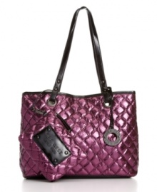 Quilting enters the gilded age with this shiny tote from Nine West available in hot glossy colors or a floral print. Comes with a matching detachable cosmetic case that tucks inside. Quilting enters the gilded age with this shiny tote from Nine West available in hot glossy colors or a floral print. Comes with a matching detachable cosmetic case that tucks inside.