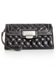 Quilty as charged! Surrender to this sleek quilted Nine West wristlet for your next date night or dinner with the girls. Silvertone hardware and a signature front plaque add the perfect finishing touches. Quilty as charged! Surrender to this sleek quilted Nine West wristlet for your next date night or dinner with the girls. Silvertone hardware and a signature front plaque add the perfect finishing touches.