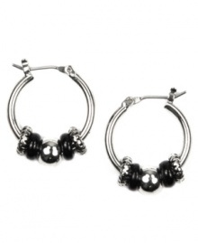 These mini hoops make a stylish impact. Nine West design features a shiny hoop setting that highlights bold, plastic jet beads. Crafted in silver tone mixed metal. Approximate diameter: 5/8 inch. These mini hoops make a stylish impact. Nine West design features a shiny hoop setting that highlights bold, plastic jet beads. Crafted in silver tone mixed metal. Approximate diameter: 5/8 inch.
