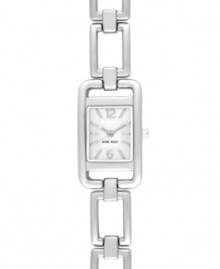 Make a striking connection with this classic design by Nine West. Crafted of silver tone mixed metal linked bracelet and rectangular case. Silver tone dial features applied numerals at twelve and six o'clock, applied stick indices, silver tone three hands and logo at six o'clock. Quartz movement. Limited lifetime warranty. Make a striking connection with this classic design by Nine West. Crafted of silver tone mixed metal linked bracelet and rectangular case. Silver tone dial features applied numerals at twelve and six o'clock, applied stick indices, silver tone three hands and logo at six o'clock. Quartz movement. Limited lifetime warranty.