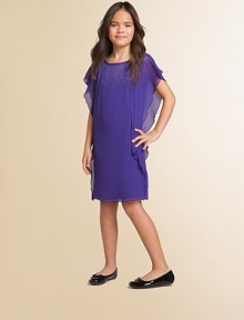 Cascading chiffon adorns this striking frock, creating a purely elegant look.CrewneckShort cascading sleevesBack zipperHem falls above kneeFully linedPolyester chiffonHand washImported Cascading chiffon adorns this striking frock, creating a purely elegant look.CrewneckShort cascading sleevesBack zipperHem falls above kneeFully linedPolyester chiffonHand washImported