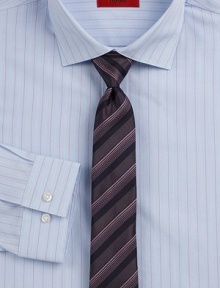 A dress classic in fine cotton, woven with berry and white pinstripes for a sharp finish. Buttonfront Spread collar Cotton Dry clean Imported A dress classic in fine cotton, woven with berry and white pinstripes for a sharp finish. Buttonfront Spread collar Cotton Dry clean Imported