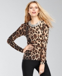 INC goes one better with a animal-print sweater: a jeweled, beaded collar takes this piece to next level of chic. INC goes one better with a animal-print sweater: a jeweled, beaded collar takes this piece to next level of chic.