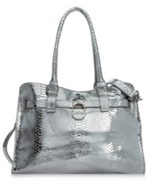 Add a little bling to your everyday ensemble and look like the rock-star you really are. Crafted in metallic, cobra-embossed leather with a signature silver-tone lock, this take-anywhere tote by Calvin Klein is definitely dressed to impress. Add a little bling to your everyday ensemble and look like the rock-star you really are. Crafted in metallic, cobra-embossed leather with a signature silver-tone lock, this take-anywhere tote by Calvin Klein is definitely dressed to impress.