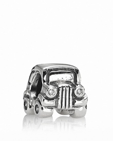 A whimsical vintage-style car charm with sparking head and tail lights in white and red cubic zirconia. From PANDORA. A whimsical vintage-style car charm with sparking head and tail lights in white and red cubic zirconia. From PANDORA.