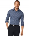 Go bold in blues. Standout style is effortless with this no-iron striped shirt from Van Heusen.