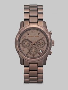 A classic designed chronograph with a modern appeal. Quartz movement Water-resistant to 10ATM Espresso stainless steel case, 39mm (1.53) Arabic numerals and index hour markers Chocolate dial Three chronograph sub dials Date display between 4 and 5 o'clock Second hand Espresso stainless steel link bracelet Imported A classic designed chronograph with a modern appeal. Quartz movement Water-resistant to 10ATM Espresso stainless steel case, 39mm (1.53) Arabic numerals and index hour markers Chocolate dial Three chronograph sub dials Date display between 4 and 5 o'clock Second hand Espresso stainless steel link bracelet Imported