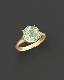 Faceted green quartz, the color of the sea, is set in 18K yellow gold.