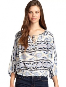 THE LOOKAllover tribal-inspired printDrawstring tie at neckFront keyhole detailThree-quarter length sleeves with elastic cuffsSmocked banded hemTHE FITAbout 21 from shoulder to hemTHE MATERIALSilkCARE & ORIGINDry cleanImportedModel shown is 5'10 (177cm) wearing US size Small. THE LOOKAllover tribal-inspired printDrawstring tie at neckFront keyhole detailThree-quarter length sleeves with elastic cuffsSmocked banded hemTHE FITAbout 21 from shoulder to hemTHE MATERIALSilkCARE & ORIGINDry cleanImportedModel shown is 5'10 (177cm) wearing US size Small.