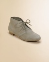 The look of the season on every girl's list, a cool lace-up style in smooth suede.Flat stacked heelLace-up frontLeather soleImported