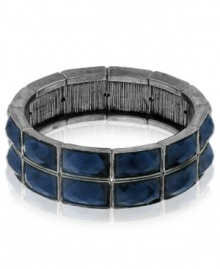 Dark blue tones create a rich experience with 2028's stretch bracelet. Crafted from hematite-tone mixed metal with Montana blue glass stones, the bangle makes for a stylish choice. Approximate diameter: 2-1/2 inches.