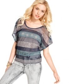 6 Degrees unites stripes of all textures on a day top that's so unique! Rock the piece with an arm load of bracelets and your favorite skinny jeans.