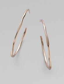 A simply chic, hammered design in sterling silver and 18k gold, finished in the warm glow of 18k rose goldplating. 18k gold and sterling silver with 18k rose goldplatingLength, about 2¼Post backImported 