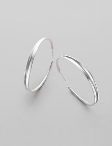 EXCLUSIVELY AT SAKS. Sophisticated hoops in polished sterling silver are subtly tapered from the middle. Sterling silver Diameter, about 2 Post back Imported