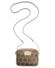 This travel-ready crossbody by MICHAEL Michael Kors is ready to jet set wherever you are. A signature exterior is accented with a high-shine logo plaque at front and chain embellished straps. This travel-ready crossbody by MICHAEL Michael Kors is ready to jet set wherever you are. A signature exterior is accented with a high-shine logo plaque at front and chain embellished straps.