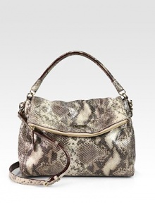 The perfect carryall for all your essentials in luxurious snake embossed leather.Double top handles, 4½ dropDetachable adjustable shoulder strap, 19-21½ dropMagnetic flap closureProtective metal feetOne zip pocket on flapOne inside zip pocketTwo inside open pocketsCotton lining13W X 8½H X 5½DImported The perfect carryall for all your essentials in luxurious snake embossed leather.Double top handles, 4½ dropDetachable adjustable shoulder strap, 19-21½ dropMagnetic flap closureProtective metal feetOne zip pocket on flapOne inside zip pocketTwo inside open pocketsCotton lining13W X 8½H X 5½DImported