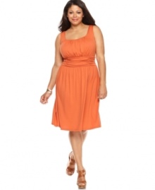 A ruched waist lends a sleek shape to AGB's sleeveless plus size dress-- dress it down for day and up for night!