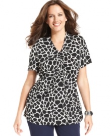 Snag safari style with Alfani's short sleeve plus size top, finished by a giraffe print-- pair it with your go-to casual bottoms.