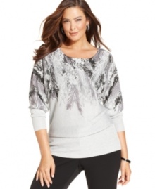 Let your style soar this season with Alfani's plus size sweater, featuring a feather-print. Let your style soar this season with Alfani's plus size sweater, featuring a feather-print.