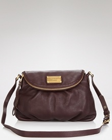 MARC BY MARC JACOBS' leather crossbody is an effortless way to add color. In a punched up hue, this purse plays nice with a monochrome palette and stacks of silver jewels. MARC BY MARC JACOBS' leather crossbody is an effortless way to add color. In a punched up hue, this purse plays nice with a monochrome palette and stacks of silver jewels.