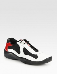 EXCLUSIVELY AT SAKS. A sneaker of renowned style and ease is stitched in a mix of patent leather and nylon with a comfortable rubber sole. Padded insoleRubber soleImported EXCLUSIVELY AT SAKS. A sneaker of renowned style and ease is stitched in a mix of patent leather and nylon with a comfortable rubber sole. Padded insoleRubber soleImported