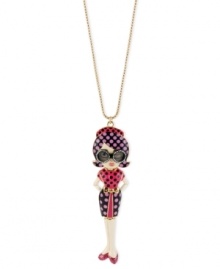 Fashionista statement. Betsey Johnson's necklace, crafted from gold-tone mixed metal, features a girl-on-the-go pendant adorned with glitter and glass crystal accents for that chic touch. Approximate length: 27 inches + 3-inch extender. Approximate drop: 5-1/4 inches.