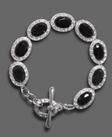 Inspire your look with artistic beauty. This lovely Monet bracelet features faceted glass & sparkling pave crystal accents set in silvertone mixed metal with a toggle closure. Approximate length: 7 inches.