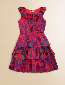 A fun print, ruffled neckline and tiered design make this the perfect party dress. Abstract print Tiered designRuffled necklineSleevelessBack zip closurePolyester charmeuseMachine washImported