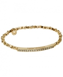 Stackable styles a must! Michael Kors' chic stretch bracelet pairs perfectly with bangles or bracelets. Beads and bar accent are crafted in gold tone mixed metal and accented by pave-set glass accents. Approximate diameter: 2-1/4 inches. Approximate width: 1/8 inch. Stackable styles a must! Michael Kors' chic stretch bracelet pairs perfectly with bangles or bracelets. Beads and bar accent are crafted in gold tone mixed metal and accented by pave-set glass accents. Approximate diameter: 2-1/4 inches. Approximate width: 1/8 inch.