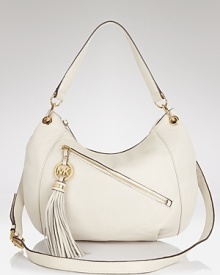 Versatile style goes luxe with this convertible shoulder bag from MICHAEL Michael Kors. This leather purse boats a removable shoulder strap to keep pace with day-to-night style demands. Versatile style goes luxe with this convertible shoulder bag from MICHAEL Michael Kors. This leather purse boats a removable shoulder strap to keep pace with day-to-night style demands.