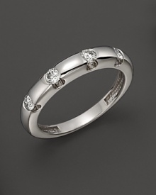 Diamonds dot a 14K white gold band.